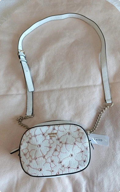 Bolso de mano con asa larga cruzada